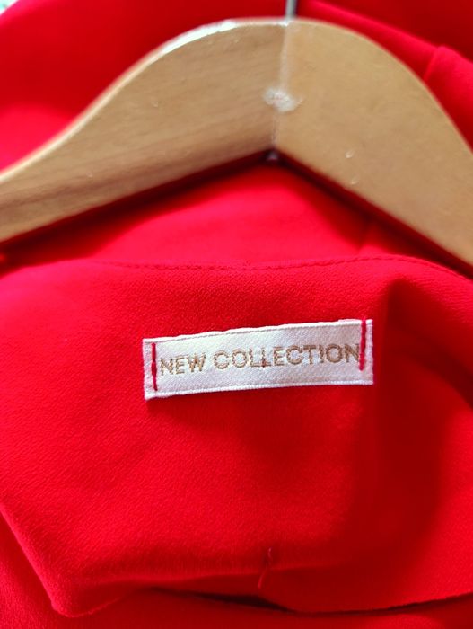 Sukienka do kolan rozszerzana na dole .luźna na duży brzuszek