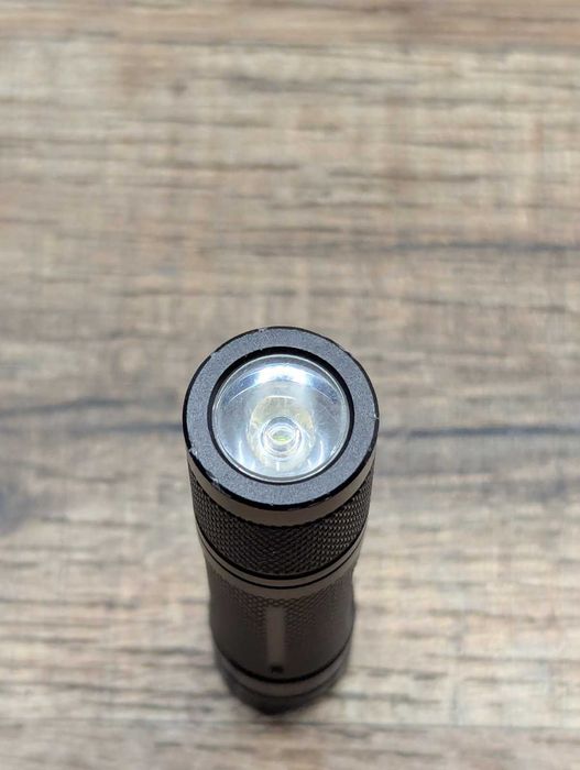 Фонарь Fenix E12 (Cree XP-E2, 130 люмен, 3 режима, 1xAA)