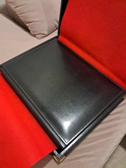 Album fotografico e mala em pele