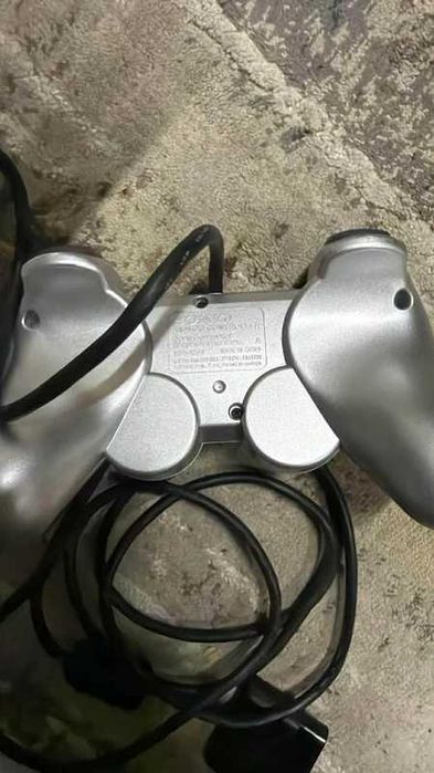 PlayStation 2  srebrny  dualshock 2 pad w stanie  idealnym bez wad ps2