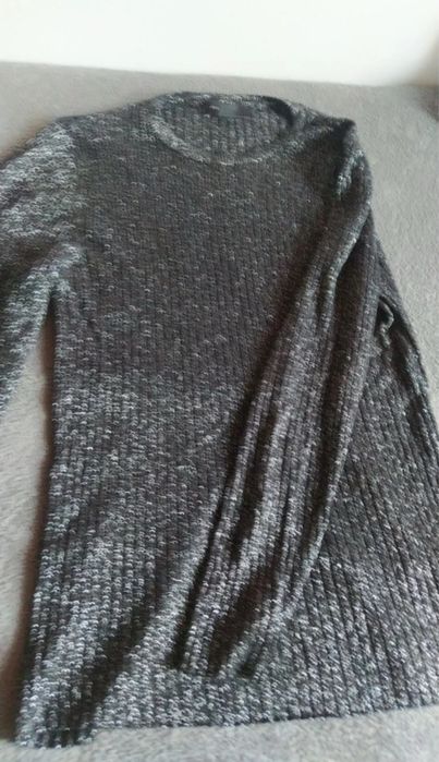 Obcisła bluza z długim rękawem świecąca.