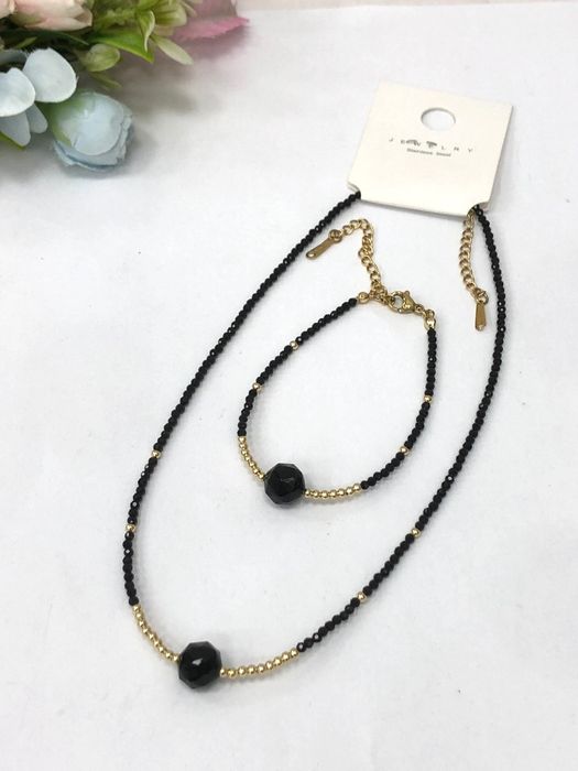 Naszyjnik i bransoletka z czarnych koralików – elegancki komplet biżut