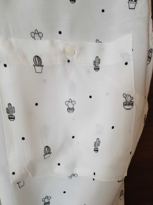 Biała koszula bez rękawów Reserved 34