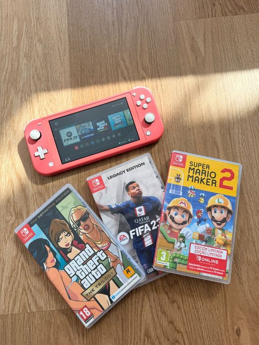 Nintendo Switch Lite + 3  jogos
