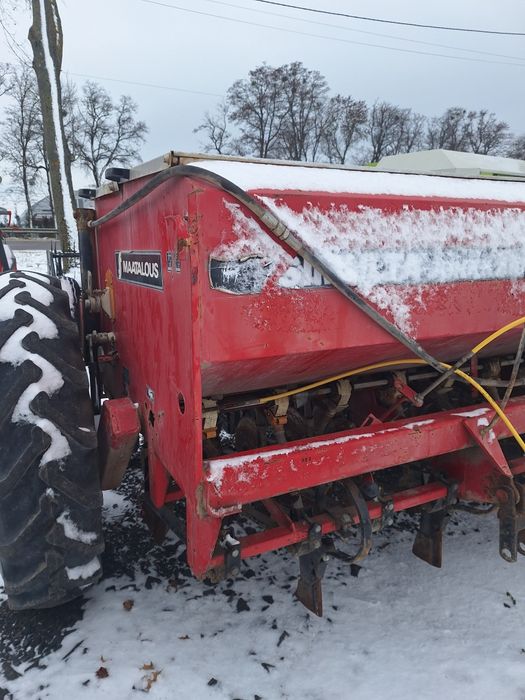 Дискова сівалка SIMULTA 2500 приципна з катками на два бачки