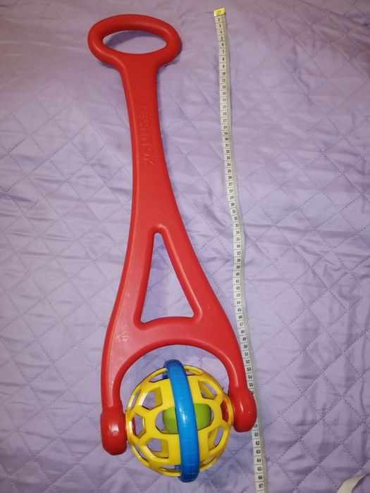 Каталка-брязкальце для малюків