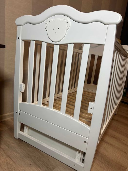 детская кроватка с маятником