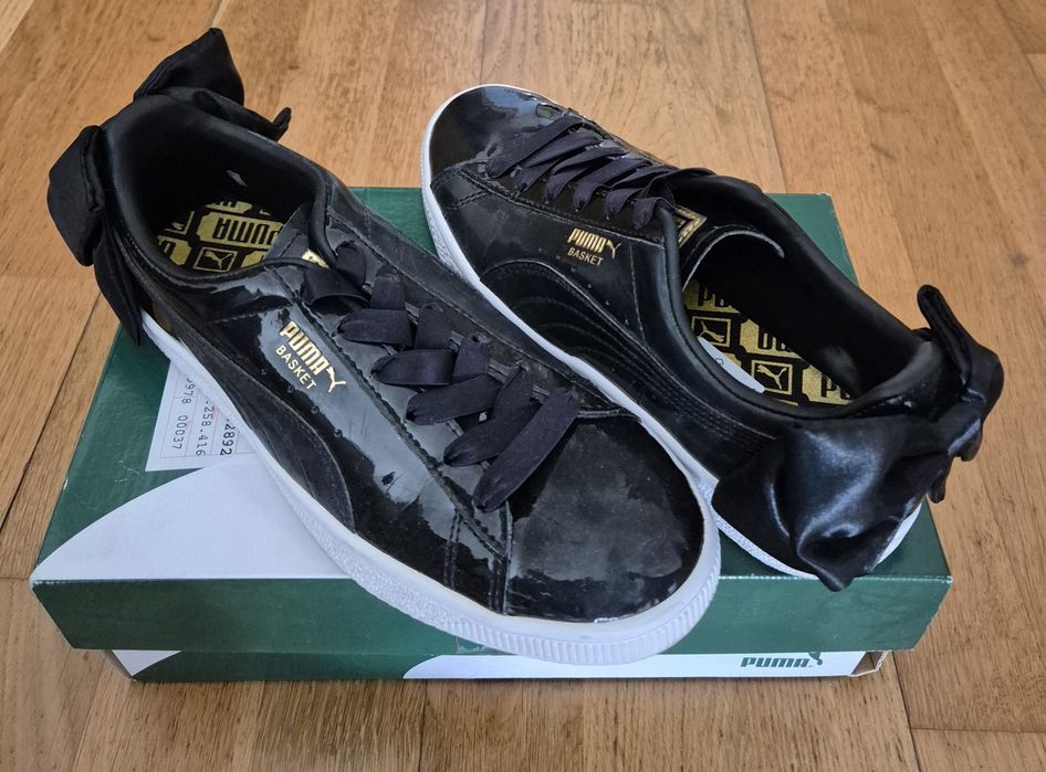 Ténis pretos Puma com laço