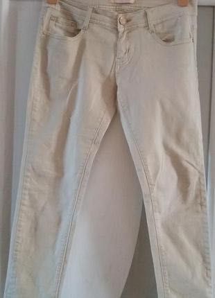 Світло-біжові  жіночі джинси розмір М.