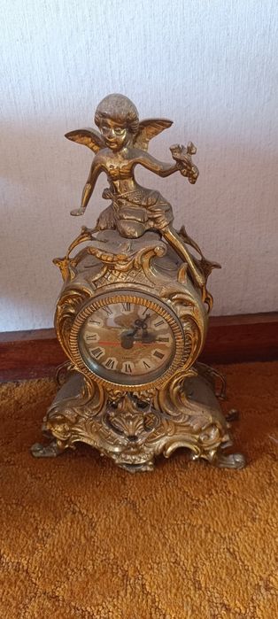 Relógio antigo de cobre