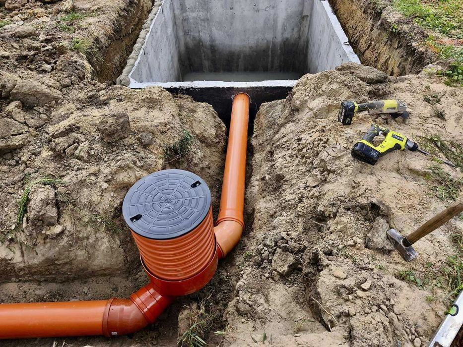 Usługi koparką odwodnienia budynków drenaż przydomowe oczyszczalnie