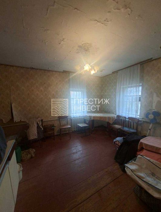 Продаж половини будинку на 5 сотках землі