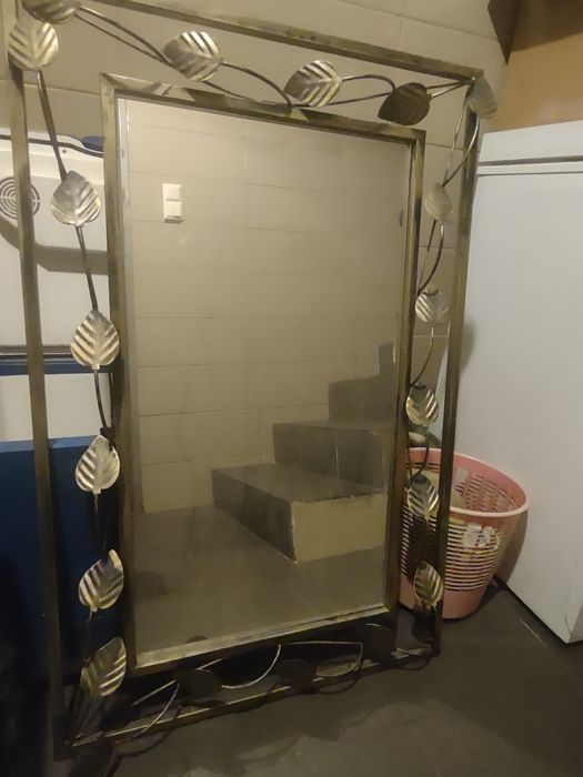 Lustro w kutej oprawie patyna