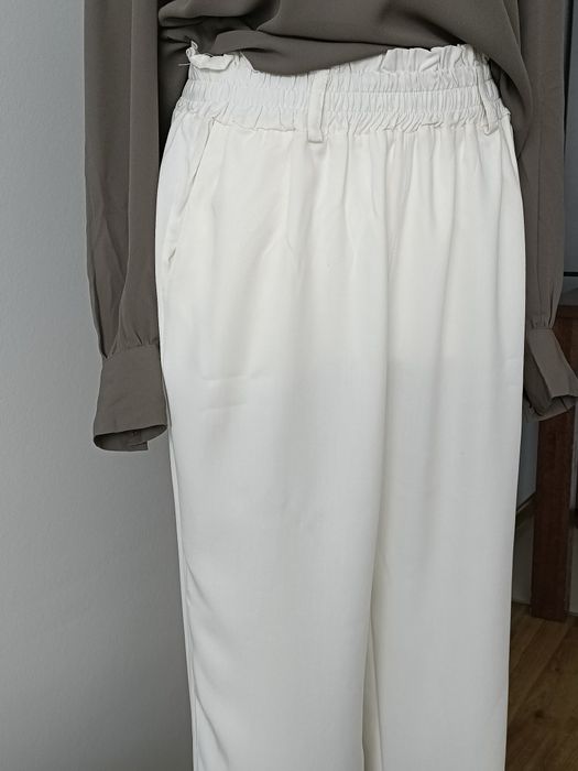 Nowe kremowe spodnie eleganckie wysoki stan wiskoza L XL