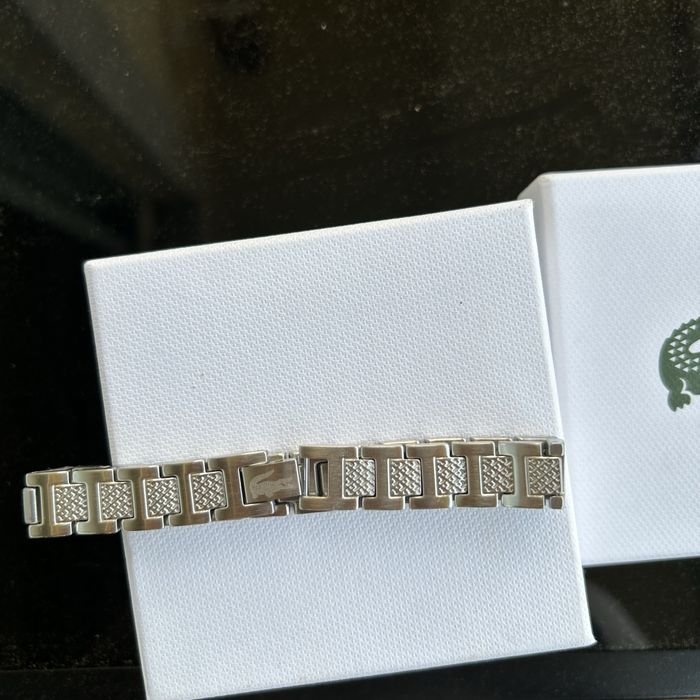 Pulseira lacoste prateada
