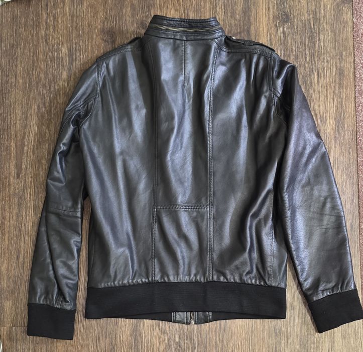 Кожаная куртка  .