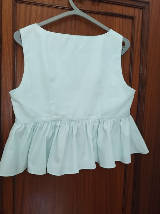 Vestido , blusa, calções  e casaco