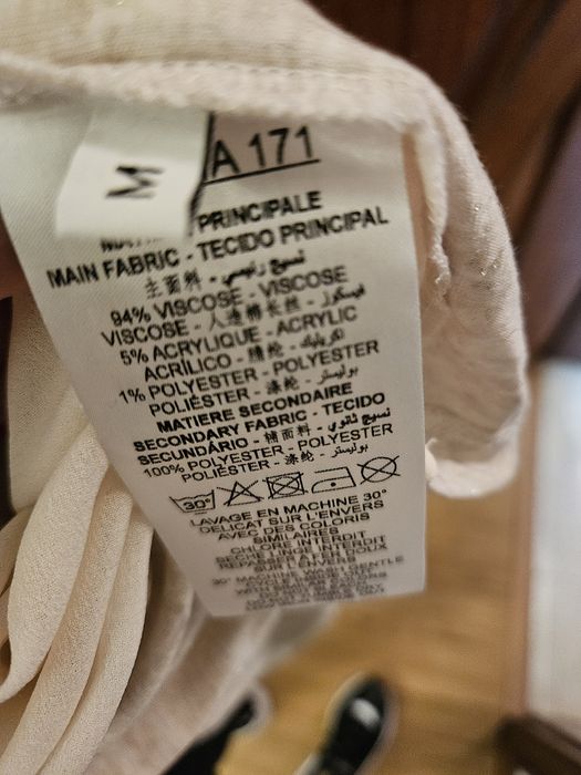 Top bege com trança