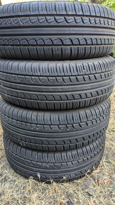 Резина Pirelli r14 комплект с дисками и  колпаками в отличном состояни