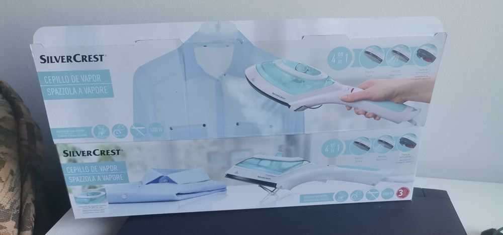 Ferro de engomar em pé