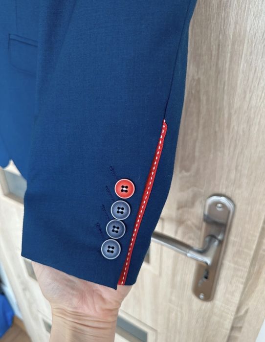 Garnitur męski młodzieżowy elegancki  granatowy  Wiliński