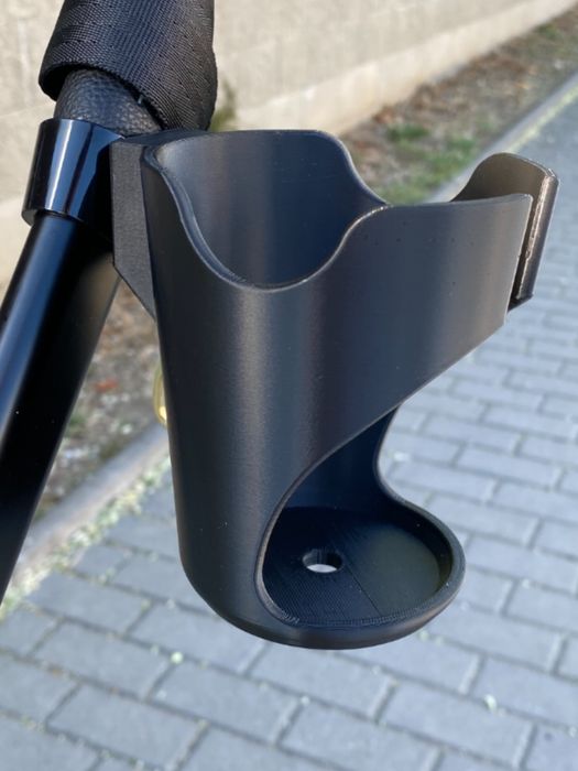 Тримач чашки для дитячої коляски – універсальний