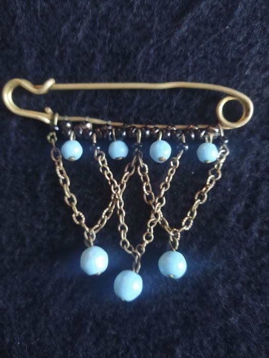 Вінтажні стильні брошки