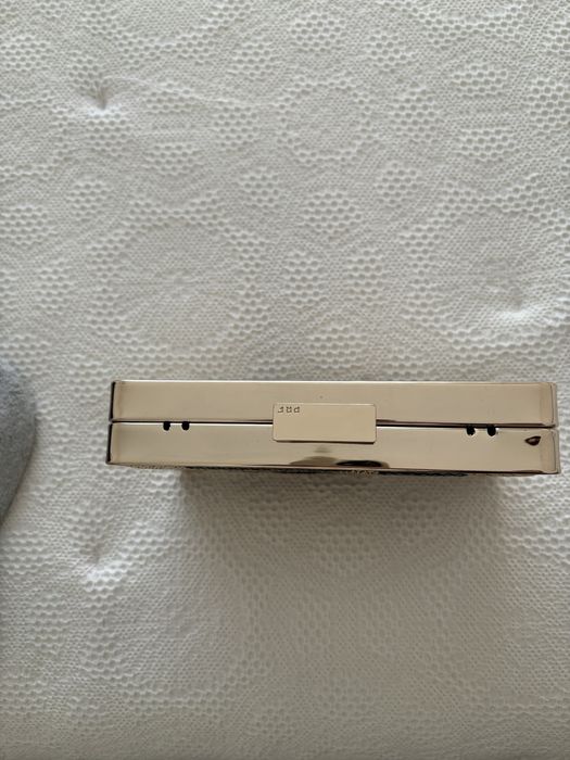 Clutch dourada da Parfois