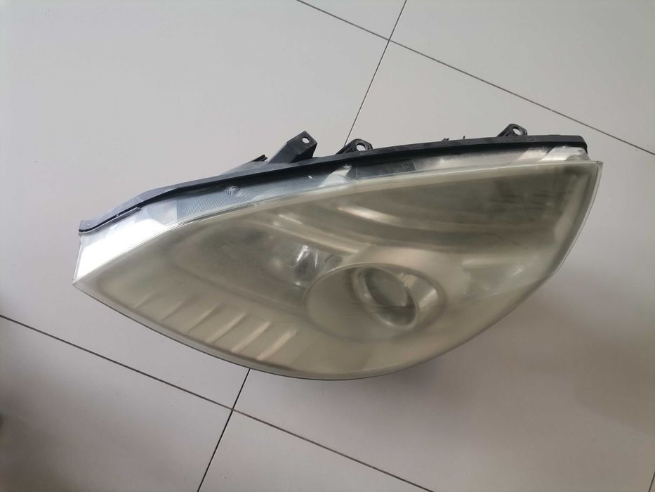 Reflektor lewy Renault Scenic II LIFT soczewska 0E