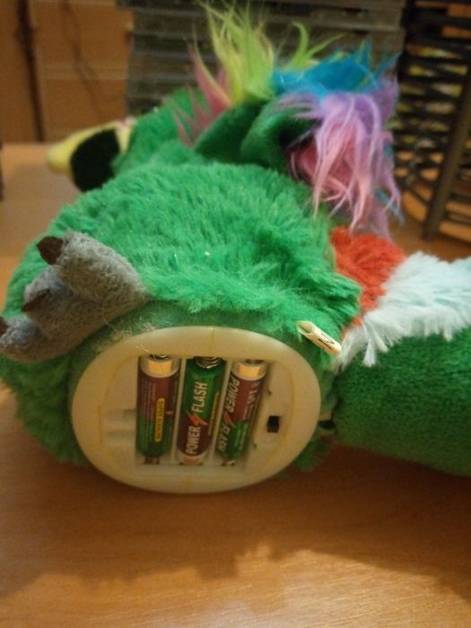 Говоряча папуга. Іграшка.