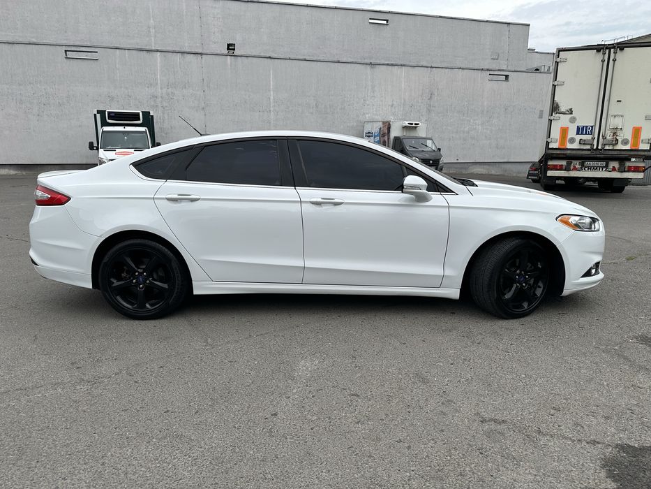 Ford Fusion 2016 VIN 3FA6P0H78GR190413 фото оголошення 12 з 19