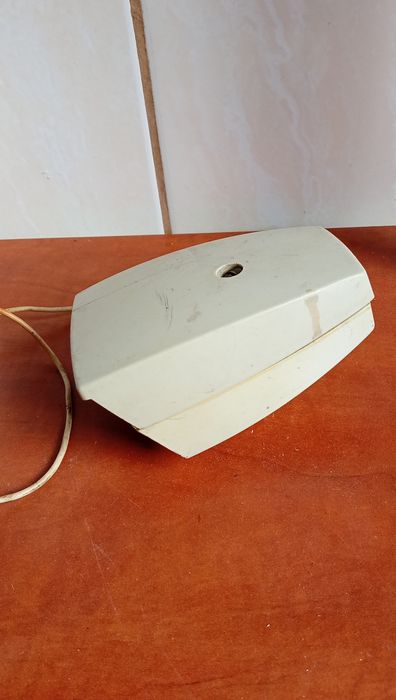 Biała lampka przednia rowerowa Romet