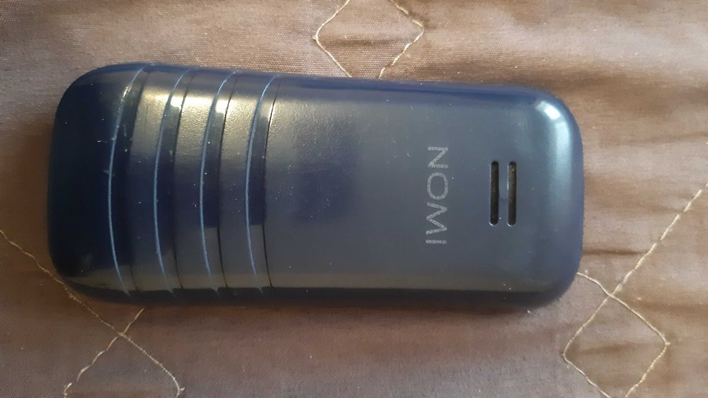 Телефон кнопочный. Nomi. Мобильный телефон.