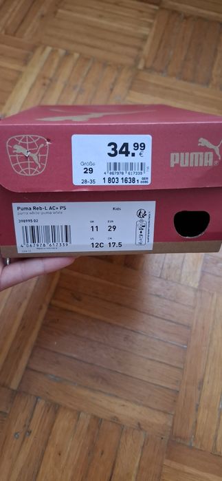 Дитячі білі кросівки Puma