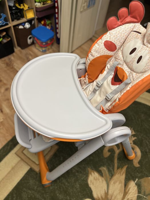 Продам дитячий  стільчик для  годування , фірми Chicco polly 25 star