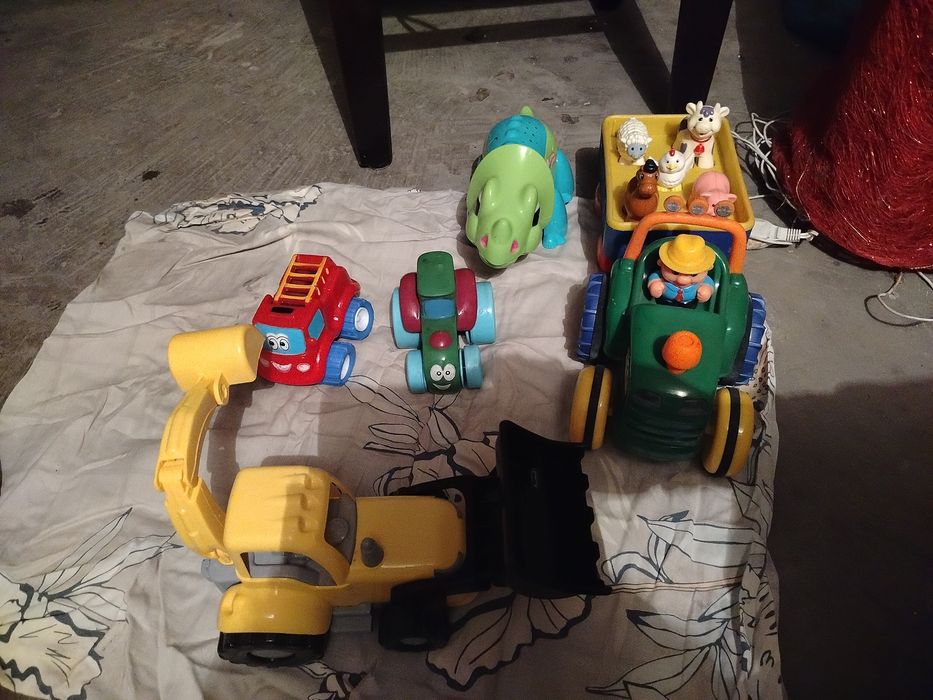 Zabawki auta koparka dinozaur