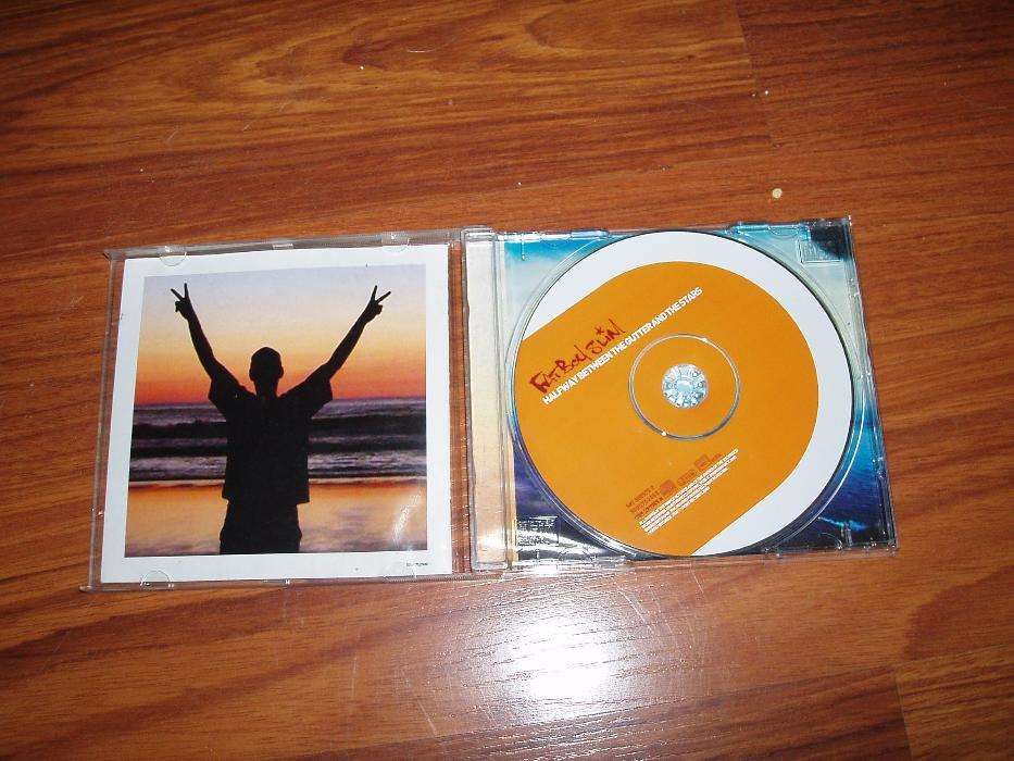 Cd Fatboy Slim Halfway between the gutter and the stars