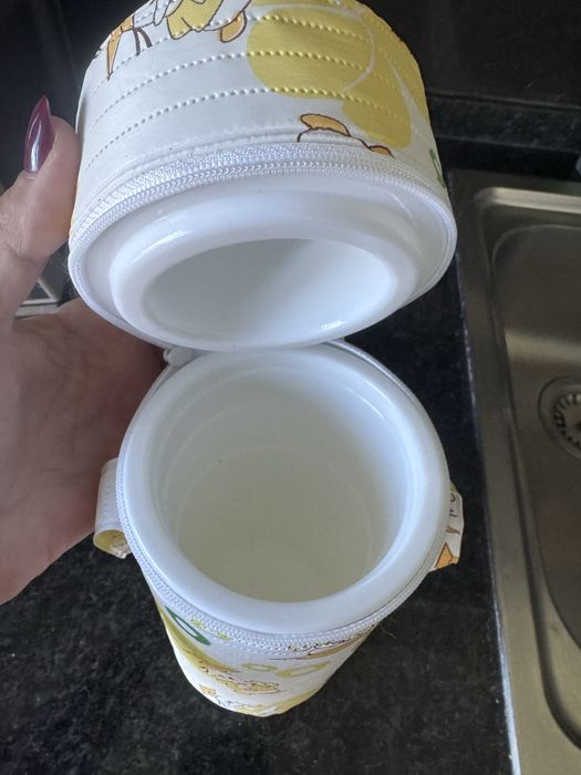 Aquecedor de biberao com oferta de copos doseadores