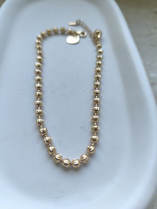 Złota bransoletka na kostkę długość regulowana