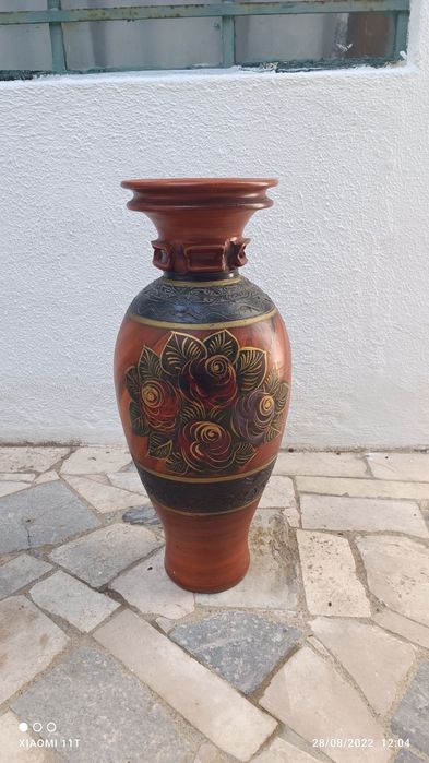 Pote decorativo com flor