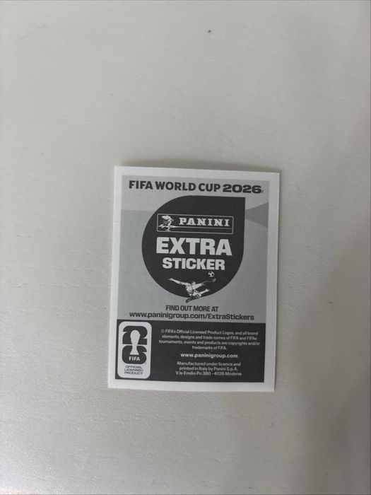 Título:  Lionel Messi Silver + Purple Extra Stickers Panini FIFA World Cup 2026 – Pack Fresh – Mint/NM