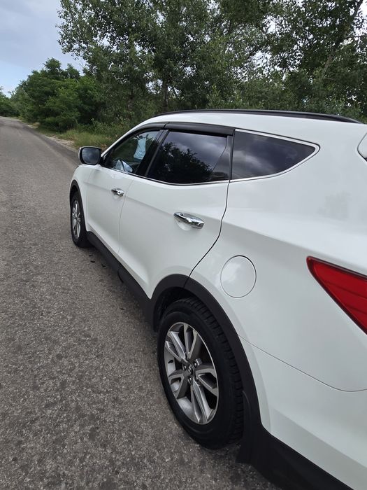 Hyundai Santa FE 2013 VIN KMHST81CDEU191498 фото оголошення 4 з 8