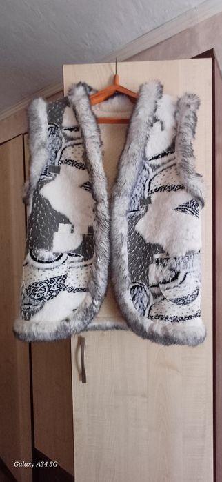 Безрукавка в отличном состоянии,