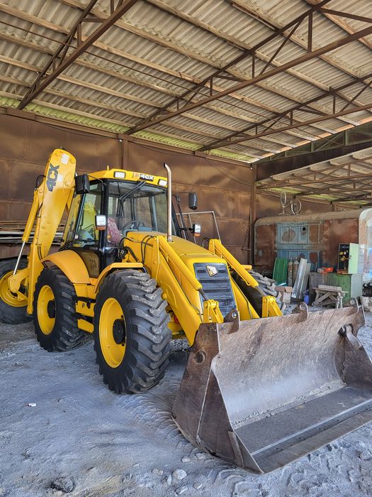 JCB-4CX екскаватор навантажувач