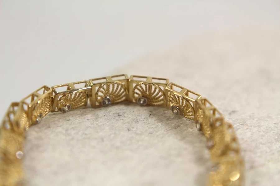 Złota ażurowa bransoletka z cyrkoniami p:585 w:5,38g r:17,5-19,5cm