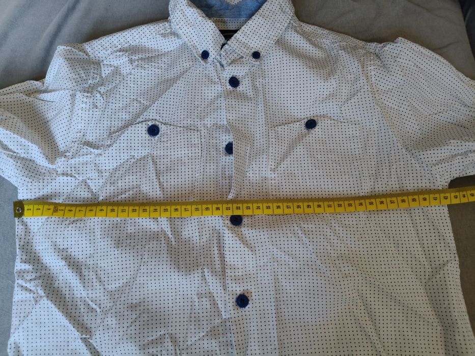 Sprzedam chłopięcą koszulę rozm.152