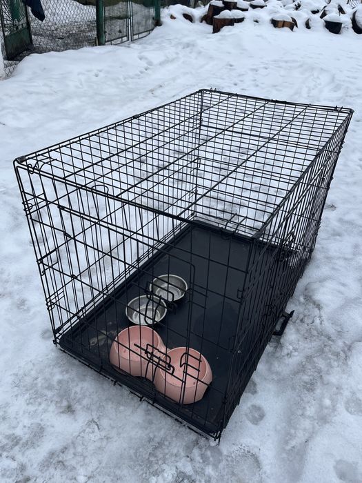 Розкладна металева клітка для собак