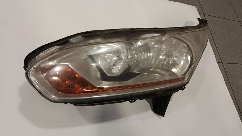 Ótica / farol esquerda FORD Transit Connect II (V408)