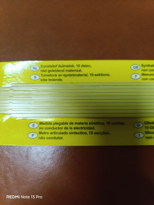 Metro articulado sintético.