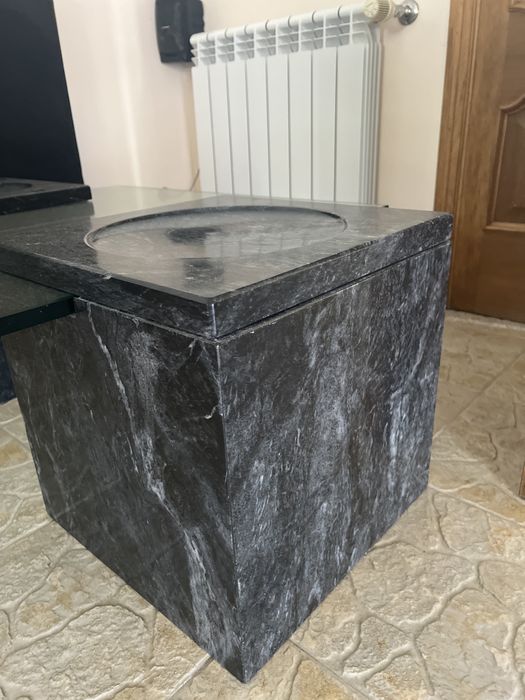 Mesa de centro em marmore e vidro